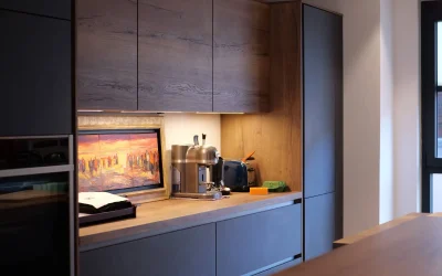 Réalisation d’une cuisine ouverte design à Beaune avec plaque Bora et four vapeur